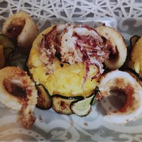 Rice cake with squid and courgettes